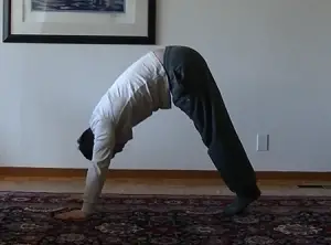 The Exercise Progressions That'll Help You Nail Handstand Pushups - Men's  Journal