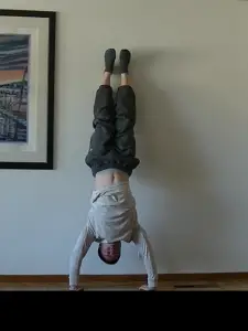 The Wall Handstand Push-up - Tutorials and Progressions - Roam Strong